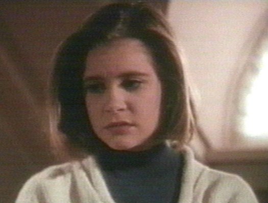 A sad-looking woman